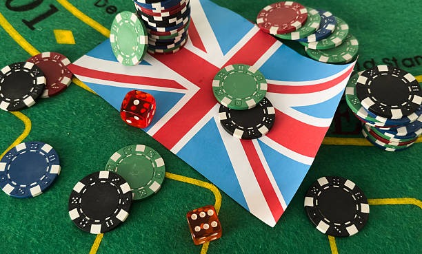 Dealer standing at live roulette table with wheel spin in progress and player betting interface visible
