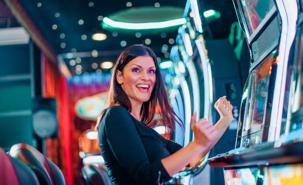 Mobile phone showing baccarat betting interface with live dealer video